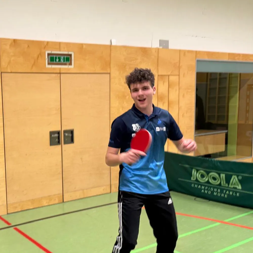 Jakob with table tennis paddle